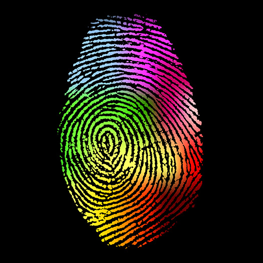 Rainbow colored fingerprint on black background